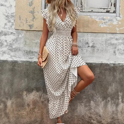 👗Elegantna i moderna jednobojna haljina s V-izrezom u resort stilu